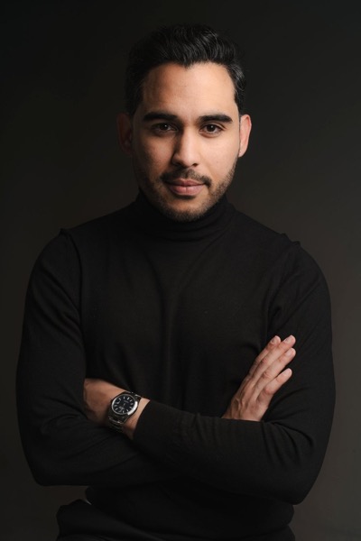 Dr. Carlos Ariza